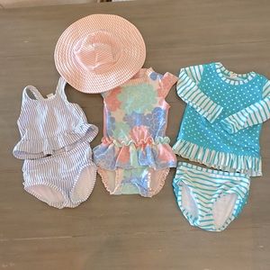 3 Ruffle Butts swimsuits for girls size 18-24 months, and swim hat size 12M-2T.